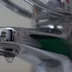 Close-up of a dripping bathroom tap.